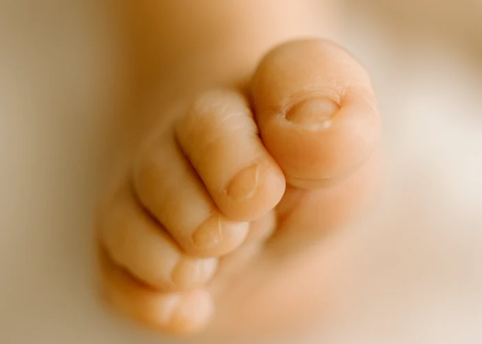 Ein kleiner Babyfuß - Babyfotografie
